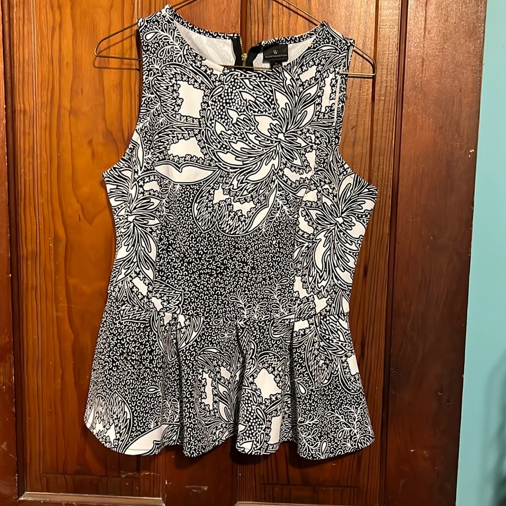 Cute top! Says medium but I wore it when large
